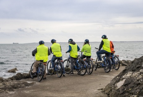 group of bikers looking out to the ocean